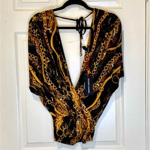 New Elegant cheetah 🐆 print top. Looks beautiful and sexy on your body 🤩for